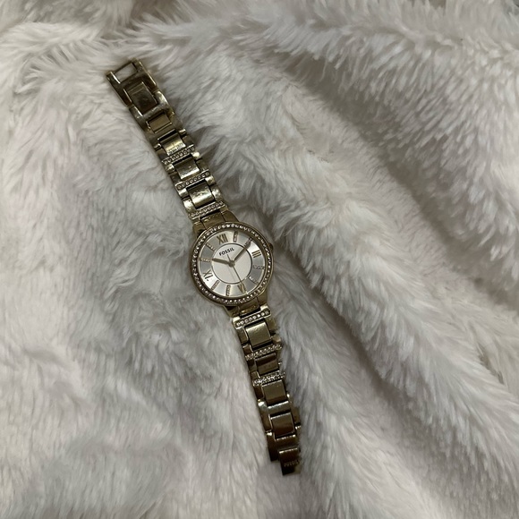 Thin gold fossil watch